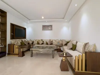 a living room with a couch and a tv at Villa 3-bedroom with Private Pool in Tamaris in Tamaris