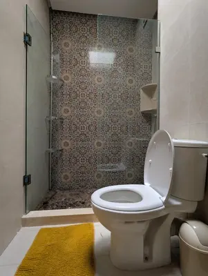 a bathroom with a toilet and a shower at Villa 3-bedroom with Private Pool in Tamaris in Tamaris