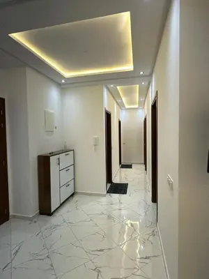 a room with a hallway with a dresser and a ceiling at appartement meublé temara in Temara