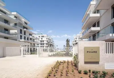 a view of the courtyard of a apartment building at escapade de luxe face a la mer in Rabat