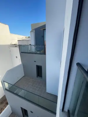 a view of a balcony with a glass window at Solstice 73 Luffy Air Studio in Casablanca