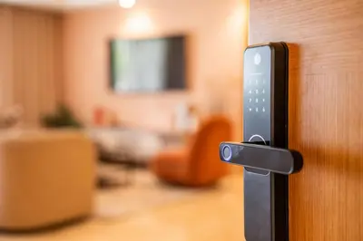 a remote control sticking out of a door at Luxury 3 Bedroom Apartment in the Heart of CFC with Swimming pool in Casablanca