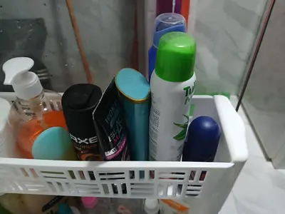a basket filled with toothbrushes and other items at chambre saada in Dar Bouazza