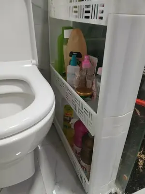 a bathroom with a white toilet and some items at chambre saada in Dar Bouazza