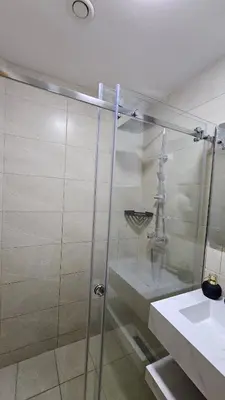 a bathroom with a shower and a sink at Modern and cozy - Central apartment in Casablanca in Casablanca