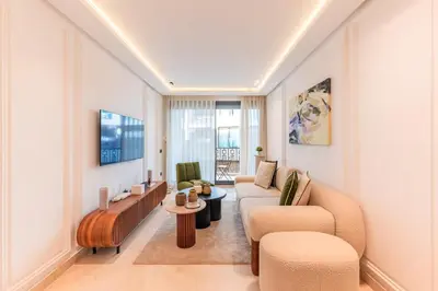 a living room with a couch and chairs at Chic Hotel-Style Apartment in Casablanca in Casablanca
