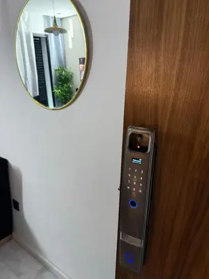 a remote control is attached to a door with a mirror at Studio Le Cœur Casablanca in Casablanca