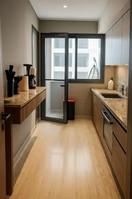 a kitchen with wooden counters and a large window at Margueri House in Mohammedia