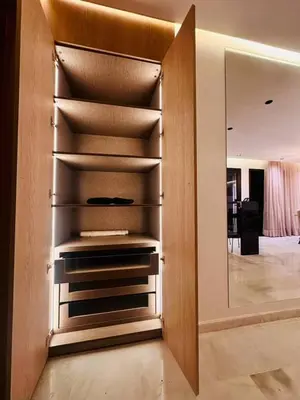a walk in closet with a mirror in a room at Modern studio in Casablanca in Casablanca