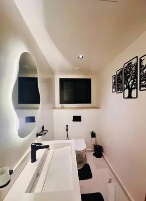 a bathroom with a sink and a toilet at Modern studio in Casablanca in Casablanca