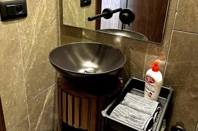 a bathroom with a sink and a mirror at New luxury central apartment in Casablanca