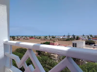 a view of a city from a balcony at Cozy Dream Land Appartement 1 bed room Sea View, Sidi Rahal Beach in Sidi Rahal