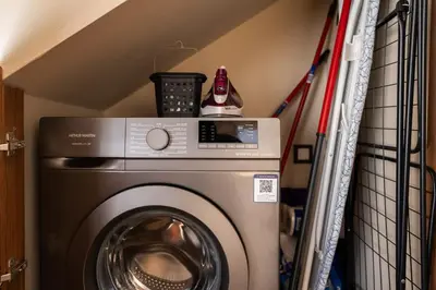 a washer and dryer in a laundry room at Résidence Dunkerque - Duplex in Casablanca