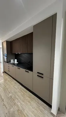 a room with a large kitchen with cabinets at Prestige Aman in Casablanca