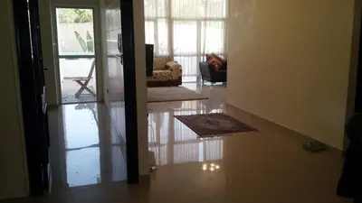 a view of a living room with the door open at appartement a la residence marina beach a mohammedia plage in Mohammedia