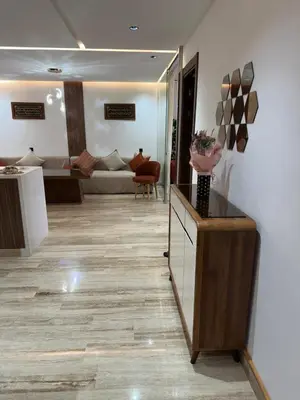a living room with a large mirror and a couch at New Living House in Casablanca