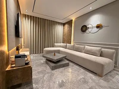 a living room with a couch and a table at Sweet Stay in Casablanca