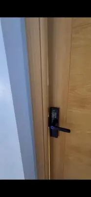 a door with a phone sticking out of it at APPARTEMENT DE LUXE 3 Façades in O Ben Slimane