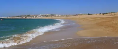 a beach with the ocean and the shoreline at Blue Ocean Escape Sidi Rhal in Sidi Rahal