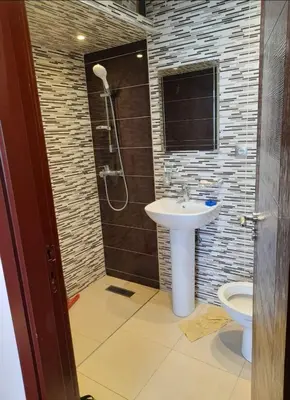 a bathroom with a sink and a shower and a toilet at Casablanca in Casablanca