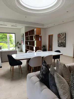 a living room with a couch and a table at Hamza in Temara