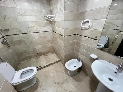 a bathroom with a toilet and a sink at Morocco House in Casablanca
