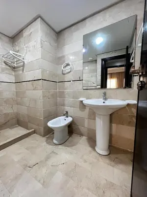a bathroom with a sink and a toilet at Morocco House in Casablanca