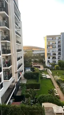 an aerial view of a park in the middle of two buildings at Luxury Stay Rabat Serenity in Rabat