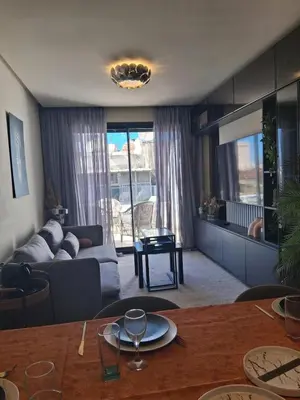 a living room with a couch and a table at La terrasse in Casablanca