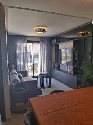 a living room with a couch and a table at La terrasse in Casablanca
