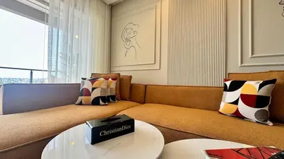 a living room with a couch and a table at Casa Stop Spot - AppartAli in Casablanca