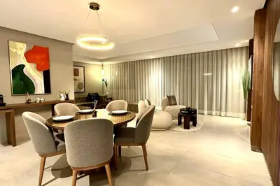 a living room with a dining table and chairs at State of Peace in Marina - By AppartAli in Casablanca