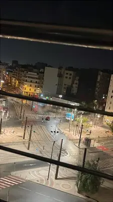 a view of a parking lot at night at Furnished apartment in the middle of the city in Casablanca