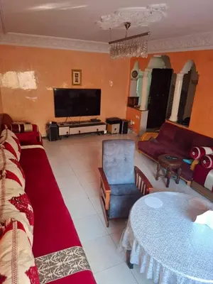a living room with a couch and a tv at Composed of 2 bedrooms and large living room in Casablanca