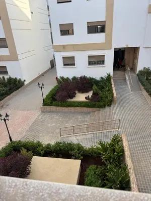 a view from the balcony of a building with a garden at فيكتوريا in Casablanca