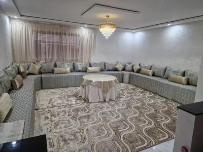 a living room with a couch and a table at فيكتوريا in Casablanca