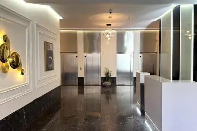 a lobby with a hallway with stainless steel at 2 Bedroom Apartment City Center in Casablanca