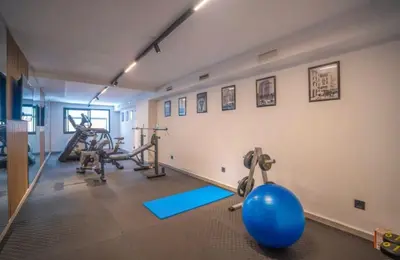 a gym with two exercise bikes and a blue ball at Terrace Solarium & Fitness & Berber Tradition in Casablanca