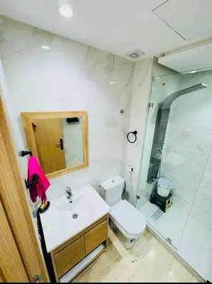 a bathroom with a toilet and a sink and a shower at Chic studio Casablanca in Casablanca