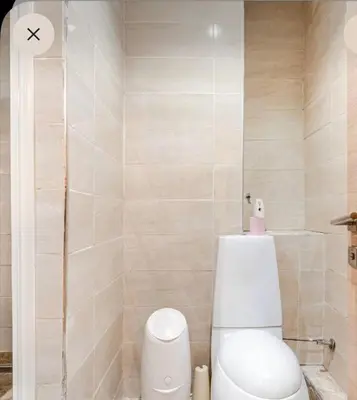 a bathroom with a toilet and a shower at luxury apartment in casablanca in Maarif