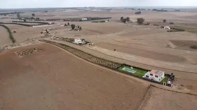 an aerial view of a farm in a field at Ferme royale Bensliman in O Ben Slimane