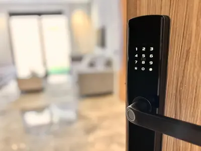 a close up of a door handle on a wooden door at Spacious, Quiet Apartment with Parking , Fiber in Casablanca