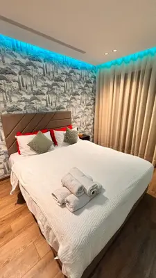 a bedroom with a bed with towels on it at Castilo in Casablanca