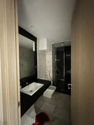 a bathroom with a sink and a toilet at Studio de luxe, lumineux et parfait in Casablanca