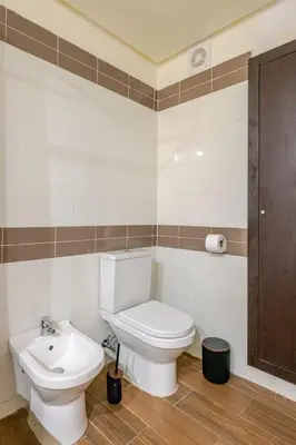 a bathroom with a toilet and a sink at Seaside 3 bedrooms apartment in Mansouria near Sablette Beach Mohammadia in Pont Blondin