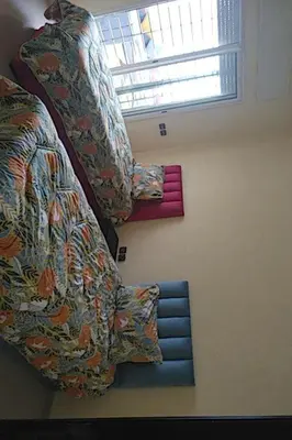 a room with two beds and a window at Marina beach in Mohammedia