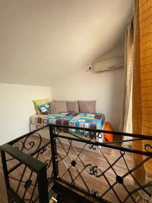 a room with a bed in a room with at Apartment in a waterfront complex in Casablanca