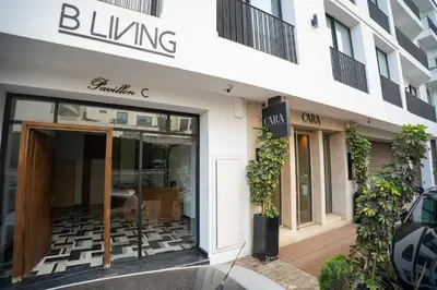 a storefront of a building with a sliding glass door at Cedar Stays Appartement 1 chambre salon, parking, climatisation, Wifi, balcon in Casablanca