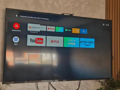 a television screen with a bunch of icons on it at Appartement Baraa Havre de sérénité entre mer et nature à tamaris in Tamaris