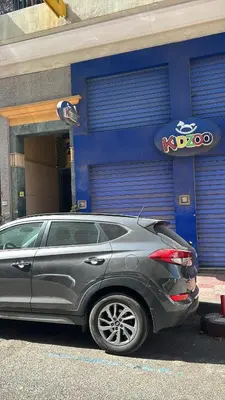 a silver car parked in front of a garage at Le repos parfait in Casablanca